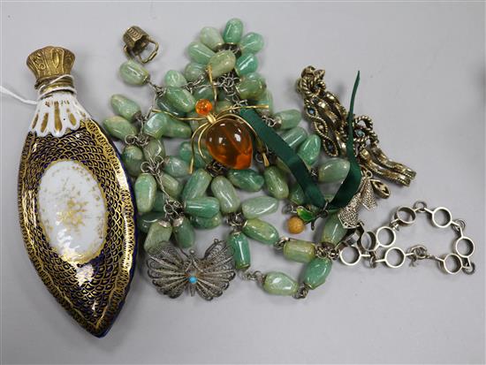 A collection of mixed items including a scent flask, brooch and other costume jewellery.